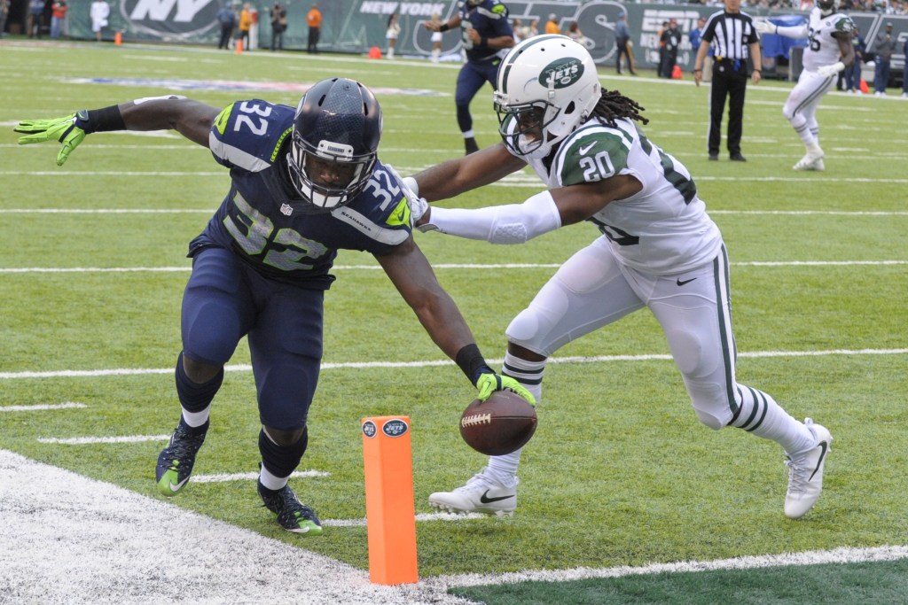 Wilson throws 3 TDs in Seahawks win