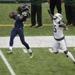 Seattle Seahawks cornerback Richard Sherman (25) intercepts a pass to New York Jets&rsquo; Brandon Marshall (15) during the second half of an NFL football game Sunday, Oct. 2, 2016, in East Rutherford, N.J. (AP Photo/Peter Morgan)