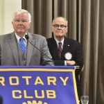 Retired Washington state Supreme Court Chief Justice Gerry Alexander, center, moderates a discussion Oct. 10 about a measure on the ballot in November that would place an income tax on the highest earners who reside in Olympia to pay for a portion of first-year college or technical school expenses for all Olympia public high school graduates and GED recipients. Hunt supports the measure and Haley opposes it. (Steve Bloom/The Olympian via AP)