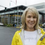 Cheryl Selby, Mayor of Olympia poses for a photo across the street from City Hall last Wednesday in Olympia. Despite supporting a statewide income tax in the past, Selby is opposed to a measure on the ballot in November that would place an income tax on the highest earners who reside in Olympia to pay for a portion of first-year college or technical school expenses for all Olympia public high school graduates and GED recipients. (Ted S. Warren/The Associated Press)