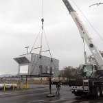Construction crews unload an air handler at the YMCA of Sequim on Monday. (Frank Pickering)