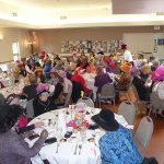 Patricia Morrison Coate/Olympic Peninsula News Group A sea of wild and colorful hats filled the dining room at Sunland Golf & Country Club for the 19th annual Mad Hatters Tea Party.