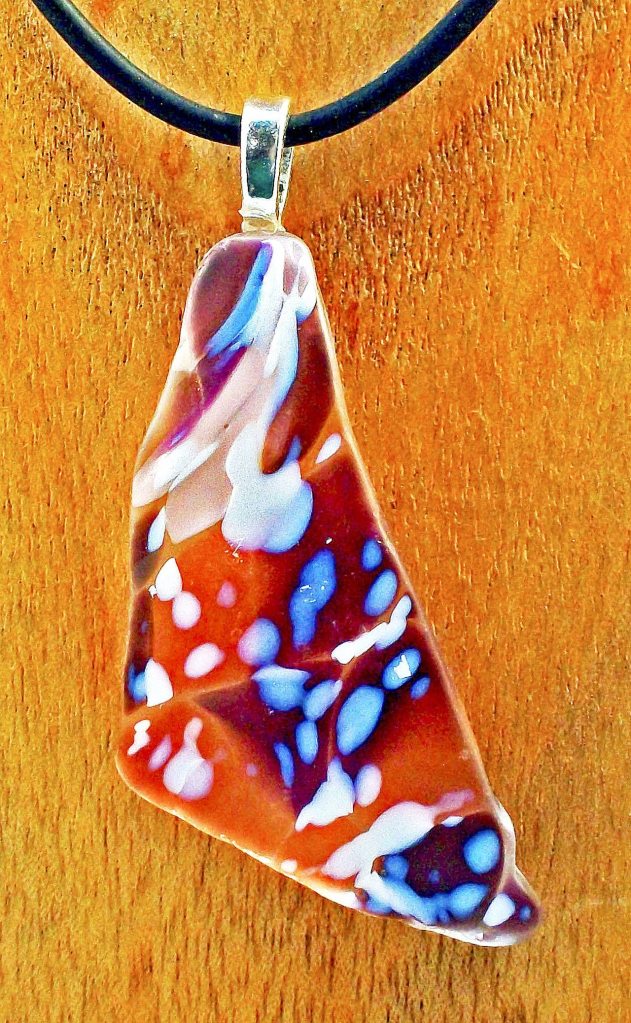 During Gallery Walk, this recycled glass pendant crafted by Nancy Rody will be on display at Gallery 9, 1012 Water St. &mdash; Nancy Rody.