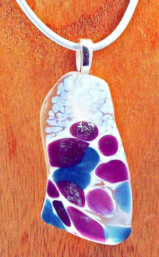 During Gallery Walk, this recycled glass pendant by Nancy Rody will be on display at Gallery 9, 1012 Water St. &mdash; Nancy Rody.