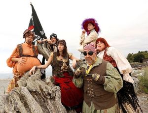 &ldquo;The Sea is a Restless Whore,&rdquo; a play produced by Peninsula College, will open Wednesday at The Metta Room in Port Angeles. From left are Marissa LeeAnn Rose Wilson, Richard Stephens, Brianna Miles, Mark Valentine (foreground), Steven Canepa and Laci Trussell. (Peninsula College)