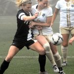 Keith Thorpe/Peninsula Daily News                                Walla Walla&rsquo;s Haley Berryman, left, and Peninsula&rsquo;s Audrey Barham, center, fight for the ball as Barnham&rsquo;s teammate Isabel Vega, right, looks on during Saturday&rsquo;s NWAC playoff game in Port Angeles.