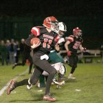 Steve Mullensky/for Peninsula Daily News                                Port Townsend&rsquo;s Berkley Hill rushes against Charles Wright on Nov. 5 at Memorial Field. Hill was named the Olympic-Nisqually 1A MVP Tuesday.