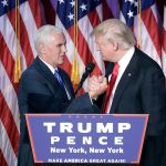 President-elect Donald Trump shakes hands with Vice President-elect Mike Pence as he gives his acceptance speech during his election night rally in New York City. (John Locher/The Associated Press)