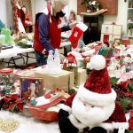 Ruth Thomson looks over the many Christmas ideas and items that will be for sale this weekend at the annual Queen of Angels Angelic Festival in Port Angeles.