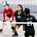 Roger Harnack/Daily Sun News                                Neah Bay&rsquo;s Jaclyn Parker (32) prepares to return the ball while Grace Buzzell, left, and Tazara Wachendorf look on during a Class 1B State Volleyball Tournament match with Oakesdale at the Yakima Valley SunDome.