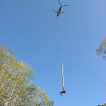 A helicopter delivers materials to use in the river channel. (Tiffany Royal/Northwest Indian Fisheries Commission)