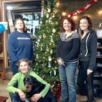 Standing from left are Jennifer Pelikan, Cheri Tinker and Anastasia Rigby, all of Sarge&rsquo;s Attic. Seated is Betsy Cadwell with her pup, Buster, the unofficial greeter and mascot of Sarge&rsquo;s Attic.