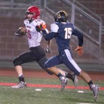 McClatchy News Service Neah Bay&rsquo;s Cole Svec rips off a long gain as Tacoma Baptist&rsquo;s Dalen Wilber pursues during the Red Devils&rsquo; 66-26 Class 1B state quarterfinal win over the Crusaders. Svec ran for 202 yards on just eight carries.