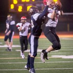McClatchy News Service Neah Bay&rsquo;s Cole Svec intercepts a pass in front of Tacoma Baptist receiver Doug Stone near the end of the first half of the Red Devils&rsquo; 66-26 victory.