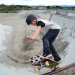 Cannon Cummins, 12, skateboards in one of the bowls at the Sequim skate park on Sunday. (Jesse Major/Peninsula Daily News)