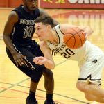 Peninsula College photo                                Peninsula College&rsquo;s Cole Rabedeaux, North Kitsap grad and 2016 Olympic League MVP, drives on Portland&rsquo;s Dario Papa-Vicente during the Pirates&rsquo; game Saturday at the Skagit Valley Turkey Tournament in Mount Vernon.