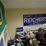 Campaign volunteers make calls to prospective voters Friday at a Republican campaign office in Issaquah. (Ted S. Warren/The Associated Press)
