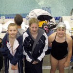Port Angeles Swim Club members Adam Weller, Josh Gavin and Mackenzie DuBois all qualified for the December championship meet at the King County Aquatic Center in Federal Way after solid performances recently at the Age Group Invitational Meet in Port Angeles.