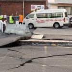A paved road was lifted and cracked today in Wellington, New Zealand, during an earthquake. A powerful earthquake struck New Zealand&rsquo;s South Island early today, killing at least two people, causing damage to buildings and infrastructure, and prompting emergency services to warn people along the coast to move to higher ground to avoid tsunami waves. (Mark Mitchell/New Zealand Herald via AP)