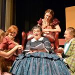 Marmee, played by Colleen Carpenter, reads to her daughters, from left, Amy (Alison Cobb), Amy (Abygail Mundy), Jo (Audrey Hughes) and Meg (Victoria Hall). (Matthew Nash/Olympic Peninsula News Group)