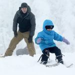 Colby Mackley of Port Angeles watches on as his 4-year-old daughter, Rio, skis at Hurricane Ridge on Sunday. (Jesse Major/Peninsula Daily News)