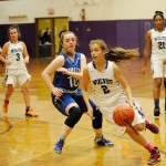 Michael Dashiell/Olympic Peninsula News Group Sequim&rsquo;s Jessica Dietzman, right, drives to the hoop while defended by Chimacum&rsquo;s Maddie Dowling.