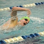 Patty Reifenstahl/for the Peninsula Daily News                                Port Angeles&rsquo; Cameron Butler competes in the 500-yard freestyle against Olympic High on Thursday.