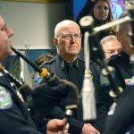 Retiring Sequim Police Chief Bill Dickinson is serenaded by the Seattle Police Pipes & Drums group. (Matthew Nash/Olympic Peninsula News Group)