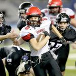 The Associated Press                                Neah Bay running back Logan Halttunen (8) runs for a touchdown against Odessa-Harrington during the second half of the Washington Div. 1B high school football championship Saturday at the Tacoma Dome.