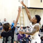 Rick Ross/Peninsula College Peninsula&rsquo;s Darrion Daniels shoots over Green River&rsquo;s Kaelin Crane in the Pirates&rsquo; 82-76 win Saturday night.