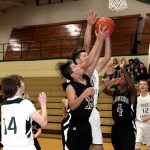 Dave Logan/for Peninsula Daily News                                Clallam Bay&rsquo;s Ramon Tinoco (13) and Port Angeles C Squad&rsquo;s Henry Irwin (with ball) compete for a rebound Also visible from left, are Port Angeles&rsquo; Tanner Lunt, Clallam Bay&rsquo;s Jamari Signor and Port Angeles&rsquo; Jadon Seibel.