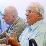 Brooke Taylor, chairman of the Port Angeles Waterfront Center, talks with Port Angeles Business Association members following his presentation Tuesday on the efforts to build a new performing arts center in Port Angeles. (Jesse Major/Peninsula Daily News)