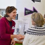 Janet Aubin, left, talks with LuAnn Rogers at the Jefferson County Democrats&rsquo; reorganization meeting at Chimacum High School last Sunday. (Diane Urbani de la Paz/For Peninsula Daily News)