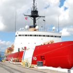 The U.S. Coast Guard Cutter Polar Star rests by a dock in Pearl Harbor, Hawaii, on Monday. The only U.S. ship capable of breaking through Antarctica&rsquo;s thick ice is undergoing repairs in balmy Hawaii this week as it prepares to head south. (Audrey McAvoy/The Associated Press)