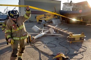 Man injured when crane tips over in Port Townsend