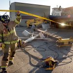 A crane collapsed just after 9:30 a.m. on Friday, injuring and briefly trapping the crane operator. (Cydney McFarland/Peninsula Daily News)