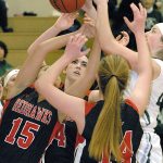 Keith Thorpe/Peninsula Daily News A free-for-all for a rebound takes the attention of Port Townsend players, from left, Jordyn King, Izzy Hammett and Jenna Carson, and Port Angeles&rsquo; Aeverie Politika, right, in the second quarter on Friday night at Port Angeles High School.