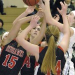 Keith Thorpe/Peninsula Daily News A free-for-all for a rebound takes the attention of Port Townsend players, from left, Jordyn King, Izzy Hammett and Jenna Carson, and Port Angeles&rsquo; Aeverie Politika, right, in the second quarter on Friday night at Port Angeles High School.