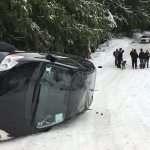 Clallam 2 Fire-Rescue responded to a vehicle accident at 1:34 p.m. Sunday about 1/4-mile up Little River Road off of Black Diamon Road. There, a 2013 Toyota Prius driven by college students from Santa Barbara, Calif., had slid into a ditch and then flipped onto its side. (Clallam 2 Fire-Rescue)