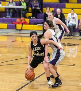 Steve Mullensky/for Peninsula Daily News                                Clallam Bay&rsquo;s Mariah LaChester, left, drives around the tight defense ofQuilcene&rsquo;s Katie Love during the Rangers&rsquo; 45-30 nonleague win over the Bruins.
