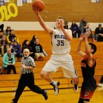 Michael Dashiell/Olympic Peninsula News Group Sequim&rsquo;s Riley Cowan, left, puts up a layup during the Wolves&rsquo; 60-45 loss to Centralia.                                Michael Dashiell/Olympic Peninsula News Group Sequim&rsquo;s Riley Cowan, left, puts up a layup during the Wolves&rsquo; 60-45 loss to Centralia.