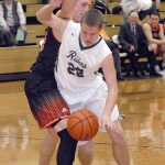 Keith Thorpe/Peninsula Daily News Port Angeles&rsquo; Easton Joslin, right, drives past Centralia&rsquo;s Hodges Bailey in the fourth quarter on Wednesday in Port Angeles.
