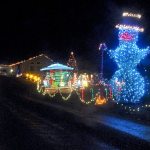 A giant snowman is one of dozens of illuminated holiday decorations available for viewing around a circle drive at 1521 S. O St., in Port Angeles. (Keith Thorpe/Peninsula Daily News)