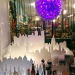 With a cityscape and glowing orb, Getables in Port Townsend got creative with its holiday window display. (Cydney McFarland/Peninsula Daily News)