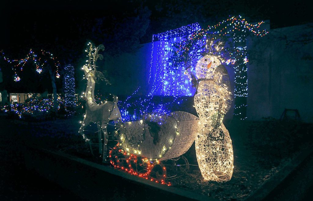 A light display shines in a Sequim yard. (Michael Dashiell/Olympic Peninsula News Group)