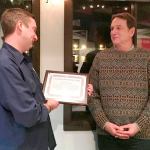 Washington CoastSavers Coordinator Jon Schmidt, left, hands Liam Antrim the 2016 CoastSaver of the Year award recently.