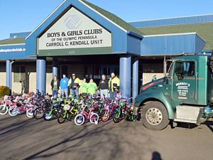 Employees of Murrey&rsquo;s Olympic Disposal, Inc., of Port Angeles assembled and delivered 65 bikes for children in need that were then donated to and distributed by Boys & Girls Clubs of the Olympic Peninsula.