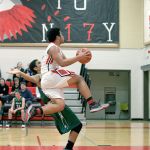 Steve Mullensky/for Peninsula Daily News                                Port Townsend&rsquo;s Detrius Kelsall skies for a layup during a loss to Vashon.