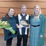 Last year&rsquo;s Angel of the Arts award recipients Selena and Louie Espinoza pose with their award and Arts Commission member Lisa Wentworth. (Port Townsend Arts Commission)