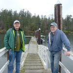 Tom Rose and Jerry Goetz stand on the dock set up for the Polar Bear Dip in Nordland where over 100 people are expected to welcome the new year. (Cydney McFarland/Peninsula Daily News)